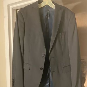 Gutteridge grey suit. British brand.